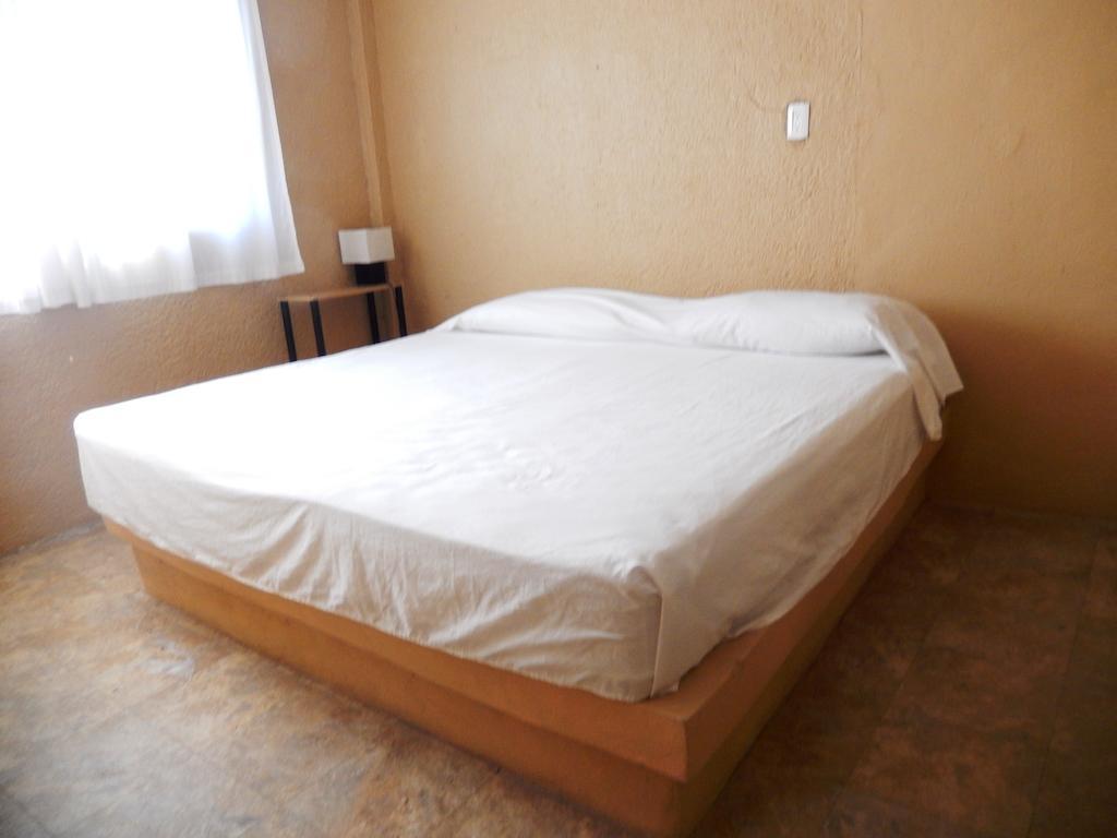 Hotel Evasion Акапулько Номер фото